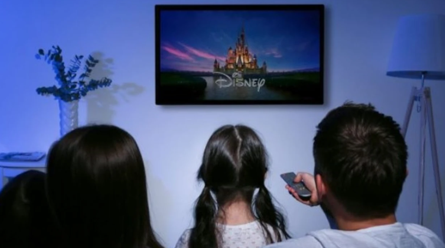Family watching a Disney movie together