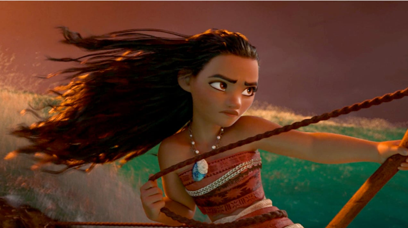 Moana is shooting a bow and arrow with a concentrated look on her face, and hair blowing in the wind