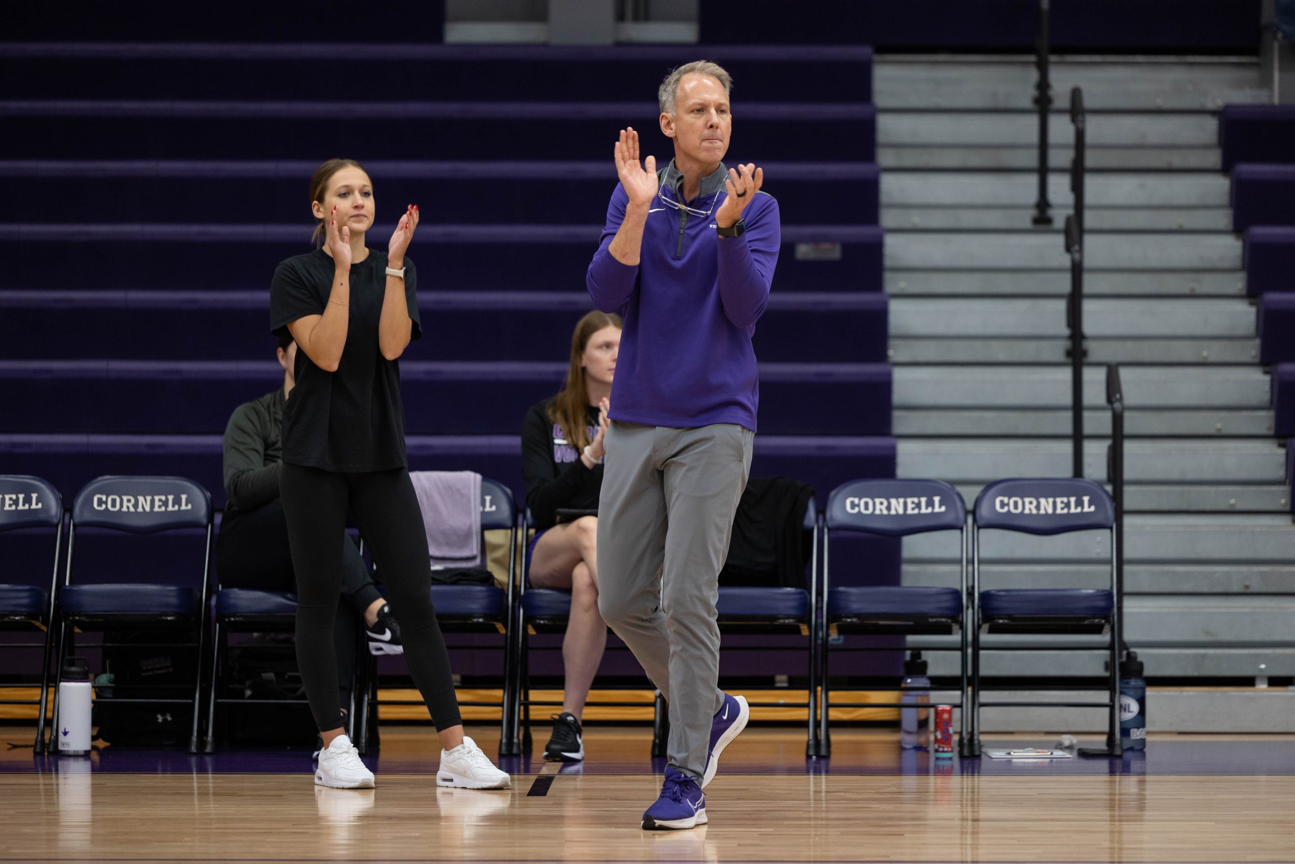 Jeff Meeker cheering on his team from the sideline.