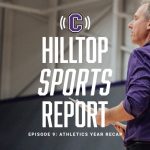 Jeff Meeker coaching from the sideline in a 2022 volleyball game.