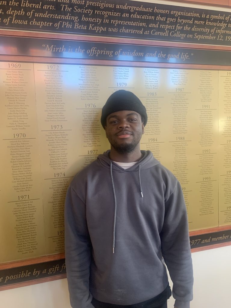 Geo Elama smiling for the camera.