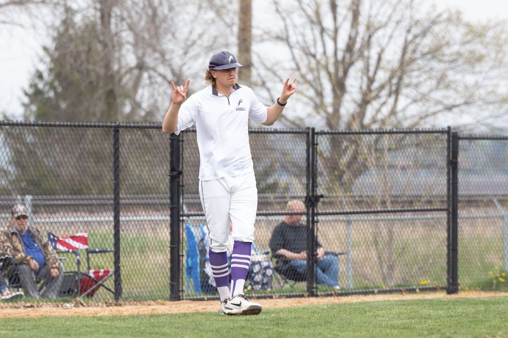 Robbie Dombrowski coaching the Rams offense from his third-base coaching box on May 6, 2023 against Ripon College.