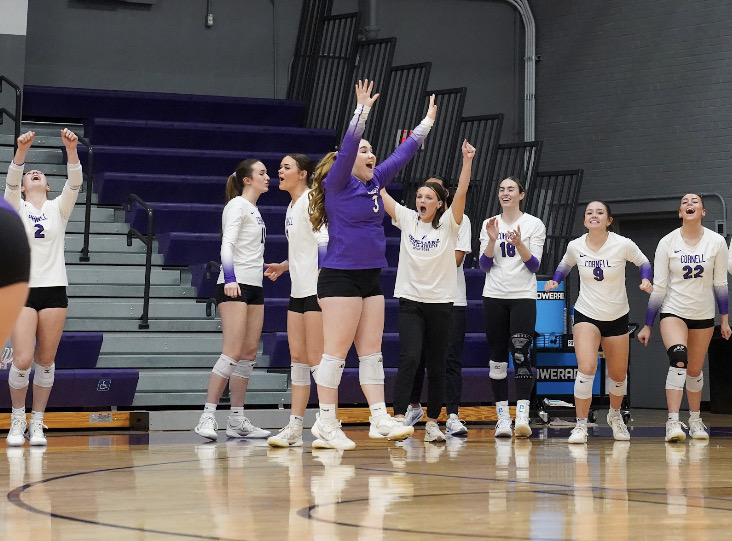 This is a picture of me jumping and celebrating a point we won in a match.