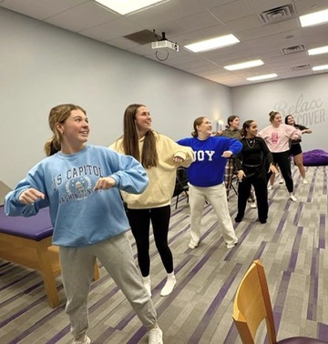 Morgan's Message members playing Just Dance.