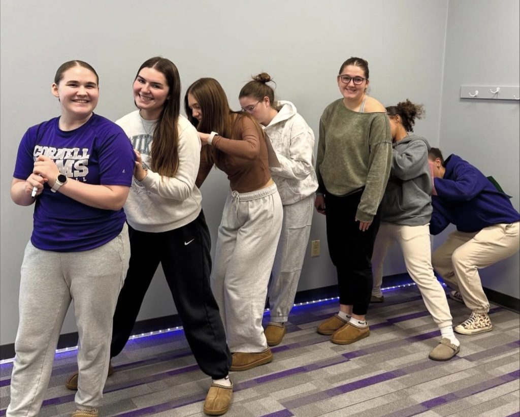 Morgan's Message members writing kind messages on each others back as part of our "I've Got Your Back" activity.